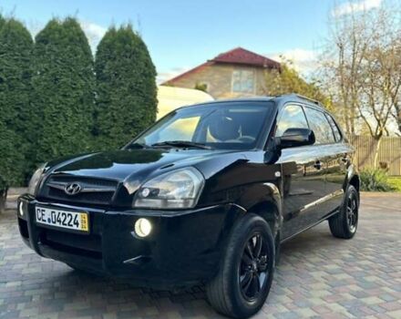 Черный Хендай Туксон, объемом двигателя 1.98 л и пробегом 198 тыс. км за 8250 $, фото 5 на Automoto.ua