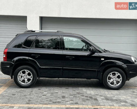 Чорний Хендай Туксон, об'ємом двигуна 2 л та пробігом 163 тис. км за 9199 $, фото 13 на Automoto.ua