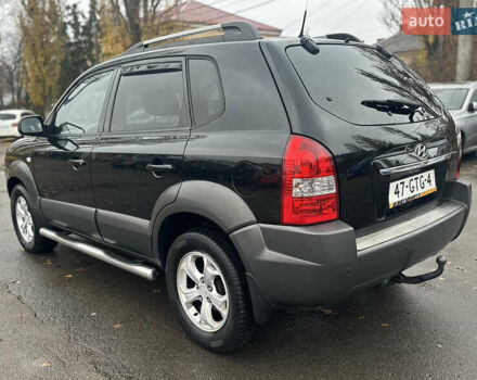 Чорний Хендай Туксон, об'ємом двигуна 1.98 л та пробігом 230 тис. км за 8700 $, фото 3 на Automoto.ua