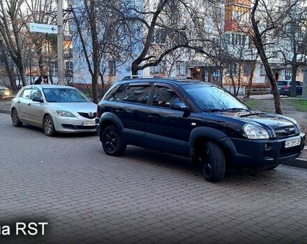 Черный Хендай Туксон, объемом двигателя 2 л и пробегом 240 тыс. км за 8700 $, фото 3 на Automoto.ua