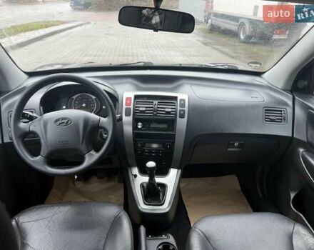 Черный Хендай Туксон, объемом двигателя 2 л и пробегом 237 тыс. км за 8350 $, фото 24 на Automoto.ua