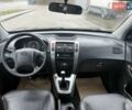 Черный Хендай Туксон, объемом двигателя 2 л и пробегом 237 тыс. км за 8350 $, фото 24 на Automoto.ua