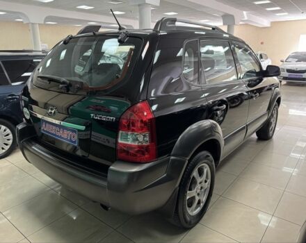 Черный Хендай Туксон, объемом двигателя 2 л и пробегом 160 тыс. км за 8300 $, фото 6 на Automoto.ua