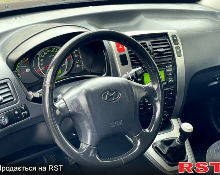 Чорний Хендай Туксон, об'ємом двигуна 2 л та пробігом 200 тис. км за 8499 $, фото 9 на Automoto.ua