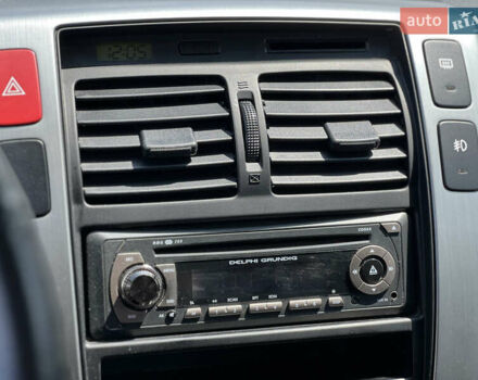 Чорний Хендай Туксон, об'ємом двигуна 2 л та пробігом 163 тис. км за 9199 $, фото 24 на Automoto.ua