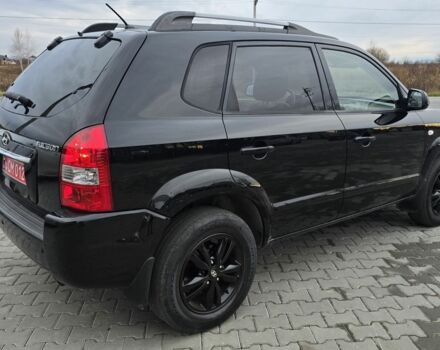 Черный Хендай Туксон, объемом двигателя 2 л и пробегом 198 тыс. км за 7999 $, фото 7 на Automoto.ua
