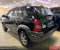 Черный Хендай Туксон, объемом двигателя 2 л и пробегом 160 тыс. км за 8800 $, фото 2 на Automoto.ua