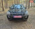 Чорний Хендай Туксон, об'ємом двигуна 2 л та пробігом 201 тис. км за 8999 $, фото 2 на Automoto.ua