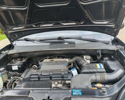 Чорний Хендай Туксон, об'ємом двигуна 1.98 л та пробігом 148 тис. км за 6199 $, фото 15 на Automoto.ua