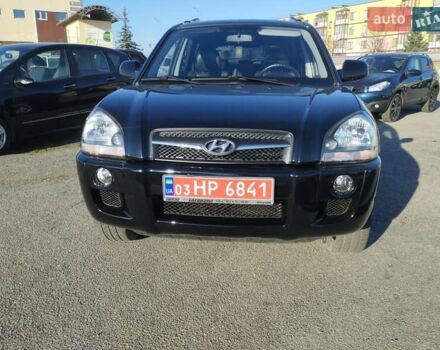 Черный Хендай Туксон, объемом двигателя 1.99 л и пробегом 159 тыс. км за 9700 $, фото 25 на Automoto.ua