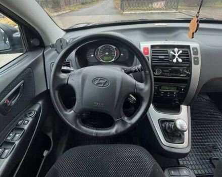 Черный Хендай Туксон, объемом двигателя 2 л и пробегом 128 тыс. км за 9200 $, фото 21 на Automoto.ua