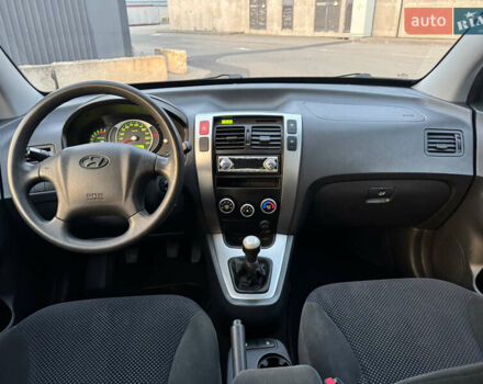 Хендай Туксон 2009 в Киеве на Automoto.ua Черный Хендай Туксон, объемом двигателя 2 л и пробегом 110 тыс. км за 8700 $, фото 28 на Automoto.ua