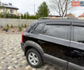 Черный Хендай Туксон, объемом двигателя 2.66 л и пробегом 205 тыс. км за 10000 $, фото 1 на Automoto.ua