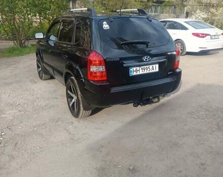 Черный Хендай Туксон, объемом двигателя 1.98 л и пробегом 51 тыс. км за 12800 $, фото 7 на Automoto.ua