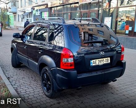 Черный Хендай Туксон, объемом двигателя 2 л и пробегом 240 тыс. км за 8700 $, фото 2 на Automoto.ua