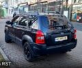 Черный Хендай Туксон, объемом двигателя 2 л и пробегом 240 тыс. км за 8700 $, фото 2 на Automoto.ua
