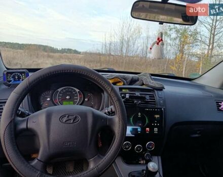 Чорний Хендай Туксон, об'ємом двигуна 1.98 л та пробігом 172 тис. км за 9500 $, фото 10 на Automoto.ua
