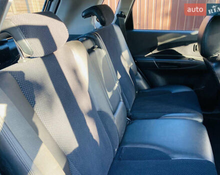 Черный Хендай Туксон, объемом двигателя 1.99 л и пробегом 95 тыс. км за 8500 $, фото 4 на Automoto.ua