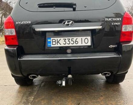 Черный Хендай Туксон, объемом двигателя 2 л и пробегом 128 тыс. км за 9200 $, фото 7 на Automoto.ua