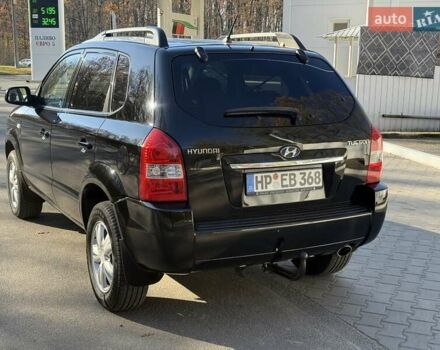 Черный Хендай Туксон, объемом двигателя 2 л и пробегом 148 тыс. км за 8700 $, фото 39 на Automoto.ua