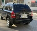 Черный Хендай Туксон, объемом двигателя 2 л и пробегом 148 тыс. км за 8700 $, фото 39 на Automoto.ua