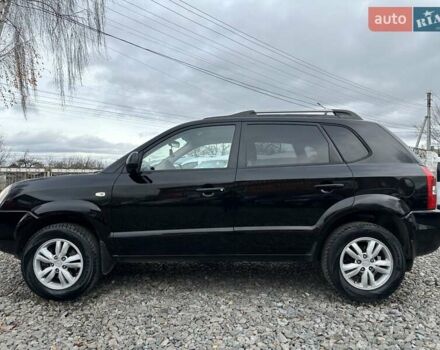 Чорний Хендай Туксон, об'ємом двигуна 2 л та пробігом 166 тис. км за 7500 $, фото 6 на Automoto.ua