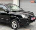 Чорний Хендай Туксон, об'ємом двигуна 2 л та пробігом 163 тис. км за 9199 $, фото 2 на Automoto.ua