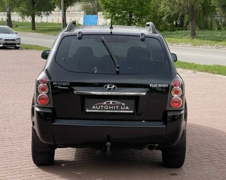 Черный Хендай Туксон, объемом двигателя 2 л и пробегом 200 тыс. км за 8999 $, фото 4 на Automoto.ua