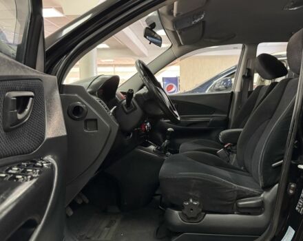 Черный Хендай Туксон, объемом двигателя 2 л и пробегом 160 тыс. км за 8300 $, фото 9 на Automoto.ua