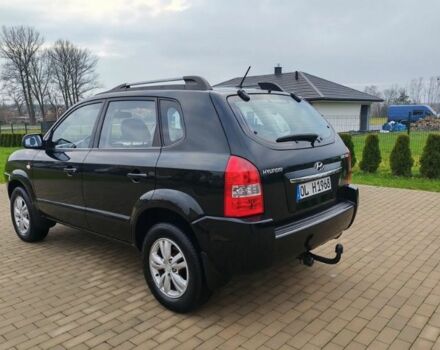 Чорний Хендай Туксон, об'ємом двигуна 1.98 л та пробігом 148 тис. км за 6199 $, фото 7 на Automoto.ua