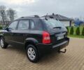 Чорний Хендай Туксон, об'ємом двигуна 1.98 л та пробігом 148 тис. км за 6199 $, фото 7 на Automoto.ua
