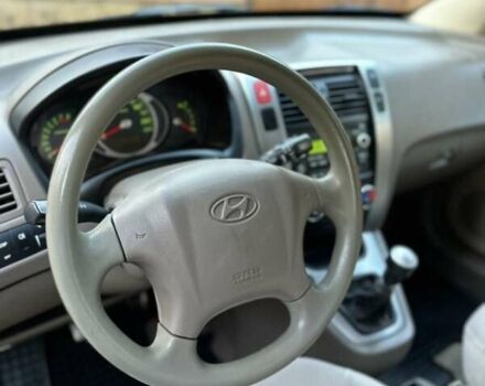 Черный Хендай Туксон, объемом двигателя 1.98 л и пробегом 198 тыс. км за 8250 $, фото 17 на Automoto.ua