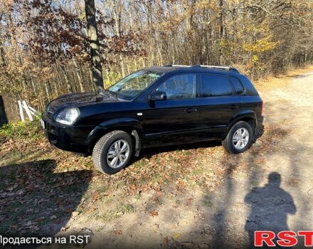 Чорний Хендай Туксон, об'ємом двигуна 2 л та пробігом 182 тис. км за 8700 $, фото 2 на Automoto.ua