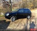 Чорний Хендай Туксон, об'ємом двигуна 2 л та пробігом 182 тис. км за 8700 $, фото 2 на Automoto.ua