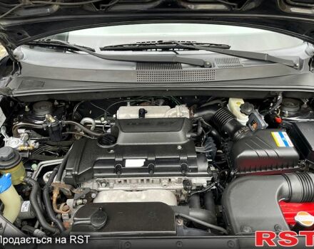 Чорний Хендай Туксон, об'ємом двигуна 2 л та пробігом 200 тис. км за 8499 $, фото 12 на Automoto.ua