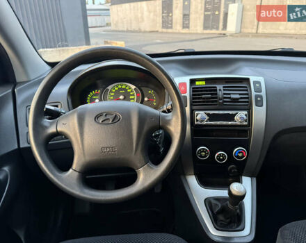 Хендай Туксон 2009 в Киеве на Automoto.ua Черный Хендай Туксон, объемом двигателя 2 л и пробегом 110 тыс. км за 8700 $, фото 31 на Automoto.ua