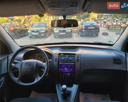 Черный Хендай Туксон, объемом двигателя 2 л и пробегом 135 тыс. км за 9750 $, фото 28 на Automoto.ua