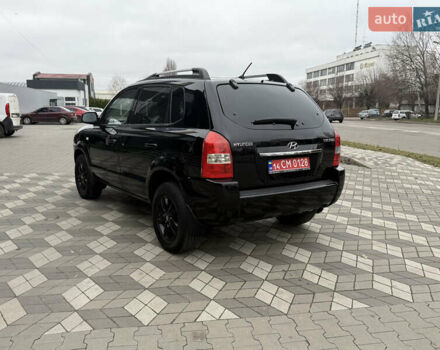 Черный Хендай Туксон, объемом двигателя 2 л и пробегом 191 тыс. км за 8500 $, фото 23 на Automoto.ua