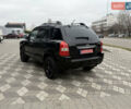 Черный Хендай Туксон, объемом двигателя 2 л и пробегом 191 тыс. км за 8500 $, фото 23 на Automoto.ua