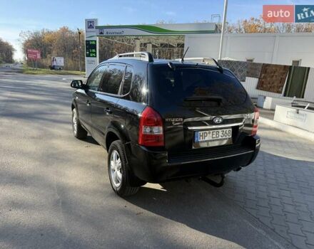 Черный Хендай Туксон, объемом двигателя 2 л и пробегом 148 тыс. км за 8700 $, фото 36 на Automoto.ua