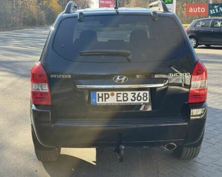 Черный Хендай Туксон, объемом двигателя 2 л и пробегом 148 тыс. км за 8700 $, фото 37 на Automoto.ua