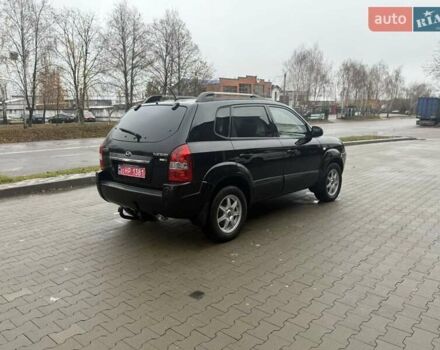 Черный Хендай Туксон, объемом двигателя 2 л и пробегом 237 тыс. км за 8350 $, фото 14 на Automoto.ua