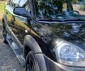 Черный Хендай Туксон, объемом двигателя 2 л и пробегом 236 тыс. км за 7400 $, фото 3 на Automoto.ua