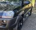 Черный Хендай Туксон, объемом двигателя 2 л и пробегом 236 тыс. км за 7400 $, фото 2 на Automoto.ua
