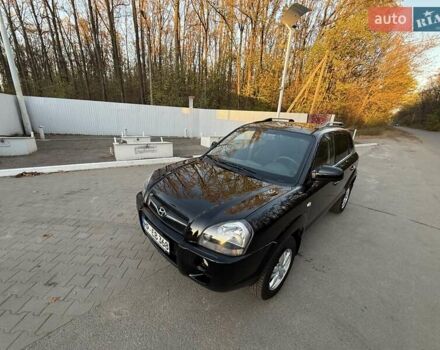 Черный Хендай Туксон, объемом двигателя 2 л и пробегом 148 тыс. км за 8700 $, фото 11 на Automoto.ua