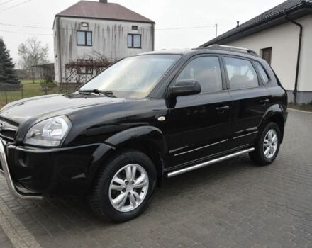 Черный Хендай Туксон, объемом двигателя 2 л и пробегом 184 тыс. км за 5480 $, фото 4 на Automoto.ua
