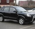 Черный Хендай Туксон, объемом двигателя 2 л и пробегом 184 тыс. км за 5480 $, фото 1 на Automoto.ua
