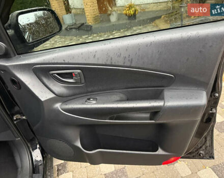 Черный Хендай Туксон, объемом двигателя 2.66 л и пробегом 205 тыс. км за 10000 $, фото 71 на Automoto.ua