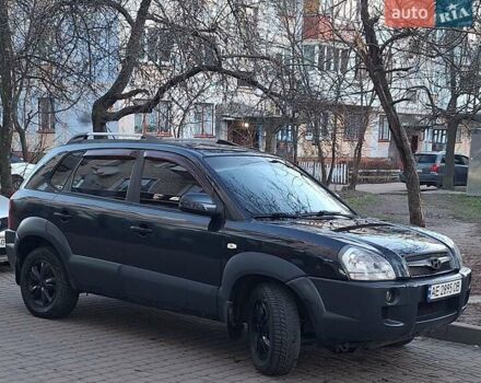 Черный Хендай Туксон, объемом двигателя 1.99 л и пробегом 240 тыс. км за 8700 $, фото 5 на Automoto.ua