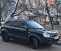 Черный Хендай Туксон, объемом двигателя 1.99 л и пробегом 240 тыс. км за 8700 $, фото 5 на Automoto.ua